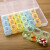 Xiangyou town small medicine box portable medicine box one week portable medicine distributor tablet packing box medicine pill box sealed storage box 21 grid storage box